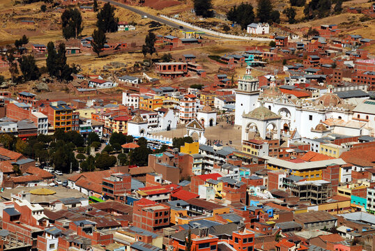 Bolivia, Copacabana, overview of the township of Copacabana, with the bright white Basilica home of the Virgin of Copacabana in the middle, with its belfry tower outstanding