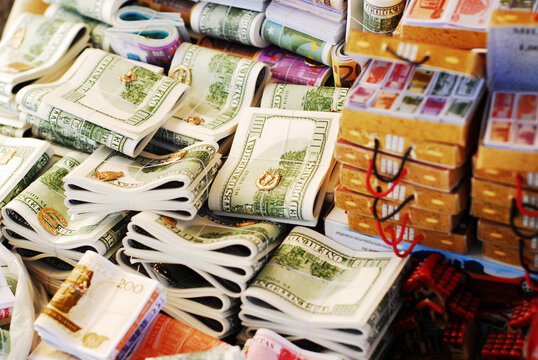 Bolivia, Copacabana, close-up of piled bundle of paper notes tied with threads, displayed for sale