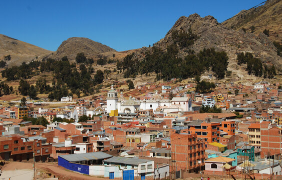 Bolivia, Copacabana, overview of the township of Copacabana, with the bright white Basilica home of the Virgin of Copacabana in the middle