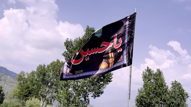 Muharram Flag Displayed on Residential House Symbolizing Religious Devotion, Islamic Tradition, Cultural Heritage and Community Commemoration During Muharram