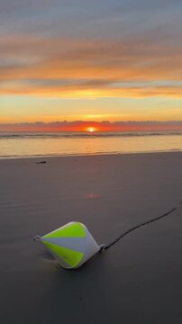 white and yellow buoy at sunset on the beach of Sankt Peter Ording	
