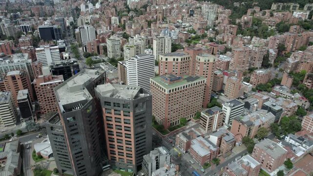 Bogota cityscape tilt down revealing the Davivienda and BBVA office buildings