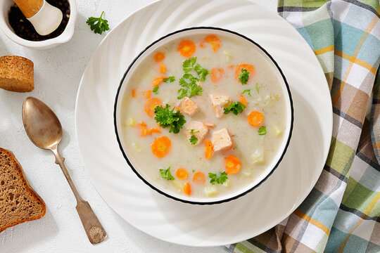 Hearty English Countryside Salmon Soup with Herbs