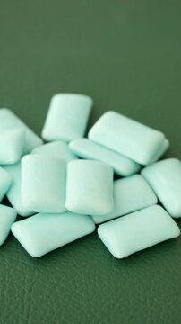 Gum pieces on a green surface