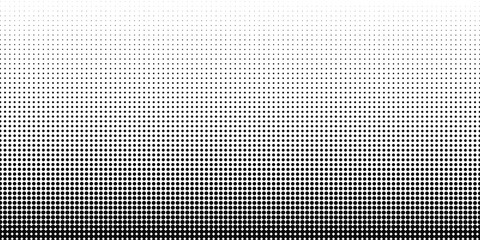 Abstract gradient halftone dots background. Black fading dots pattern on a transparent backdrop. Vector design © KatyaD