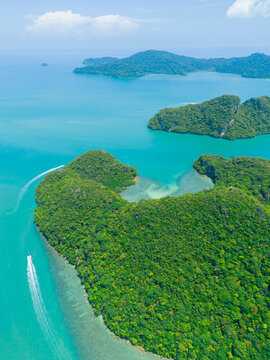 Aerial drone view of calm blue sea scenery at Dayang Bunting Lake in Langkawi Island, Kedah, Malaysia.