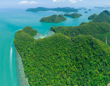 Aerial drone view of calm blue sea scenery at Dayang Bunting Lake in Langkawi Island, Kedah, Malaysia.