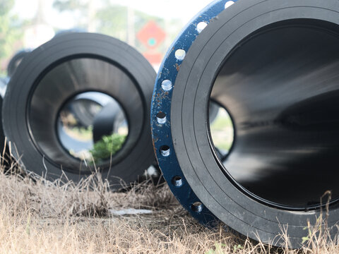 High-density polyethylene (HDPE) or steel pipes are used for high-pressure water supply these blue, flanged and bolted pipes are installed both above and below ground.