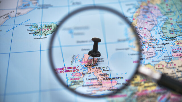 Pin marked on map of Glasgow in Scotland with a magnifying glass