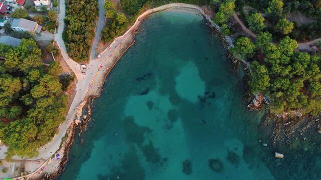 Aerial top down view of lanterna beach on hvar island, croatia