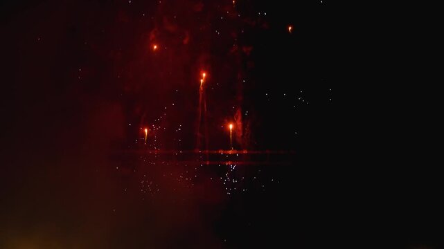 4K Slow motion fireworks display with slow tilt up camera movement in Valencia, Spain
