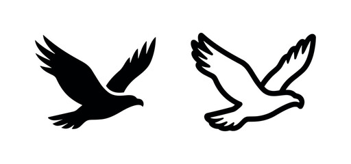 Obraz premium Flying eagle and bird of prey silhouettes