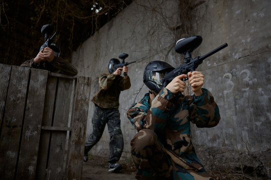 Group of soldiers take defensive positions during tactical weapon training