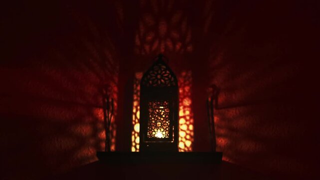 Halloween Flickering Candle in Vintage Lantern on a Shelf