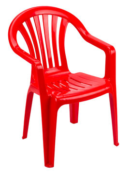 A bright red, basic plastic monobloc chair featuring armrests and vertical back slats, isolated on a transparent background.