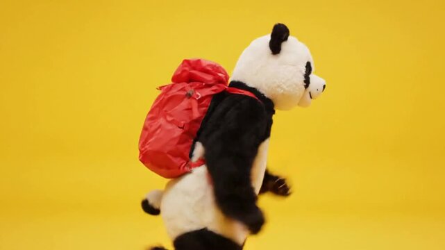 Panda bear costume runner with backpack on bright yellow background