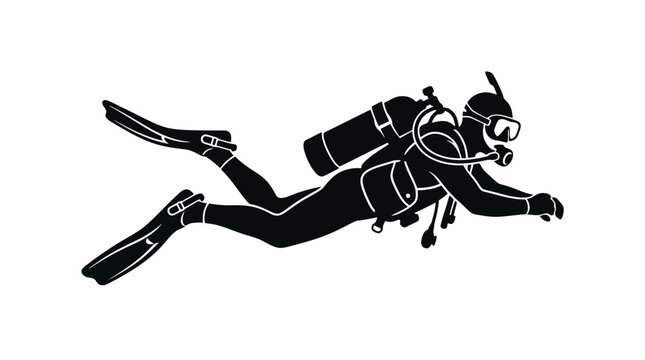 Scuba diver in black silhouette swimming.