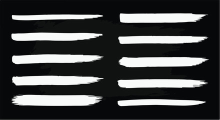 A striking collection of clean, bold white chalk lines and brush strokes on a dark background. © Mend
