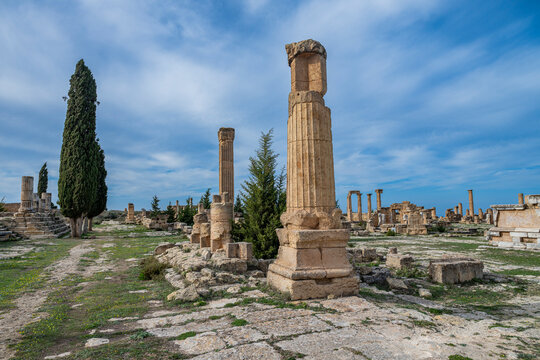 Exploring the ancient ruins of Cyrene in Eastern Libya with tall columns and clear skies