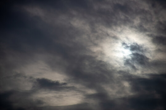 Moody Sky with Sun Hidden by Clouds