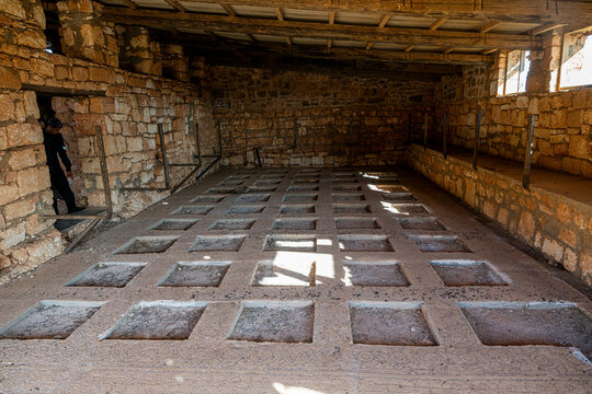 Exploring the interior of an old church in Qasr Libya, showcasing ancient architecture and historical significance in Libya