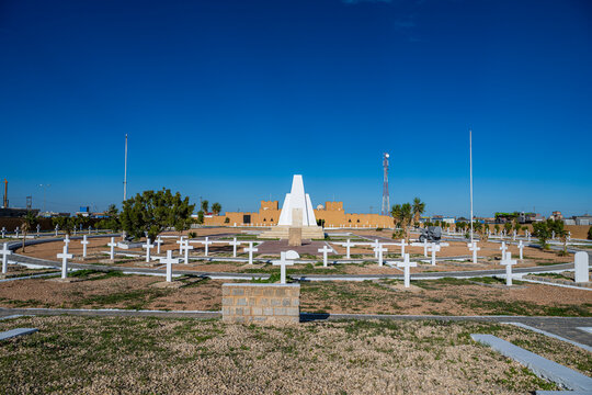 Cemetery honoring French soldiers of World War 2 in Tobruk, Libya with white crosses and memorial structure