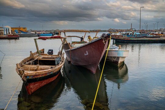 Fishing boats docked at Suakin Island amid still waters along Sudans Red Sea coast