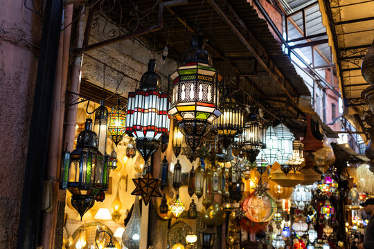 Exploring markets with colorful lanterns and lights in Marrakesh old medina