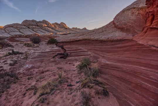 Colorful sandstone formations showcase natural beauty on the Paria Plateau in Arizona's wilderness at sunset