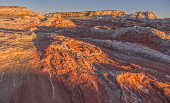 Colorful sandstone formations show natural patterns at White Pocket in the Vermilion Cliffs National Monument in Arizona