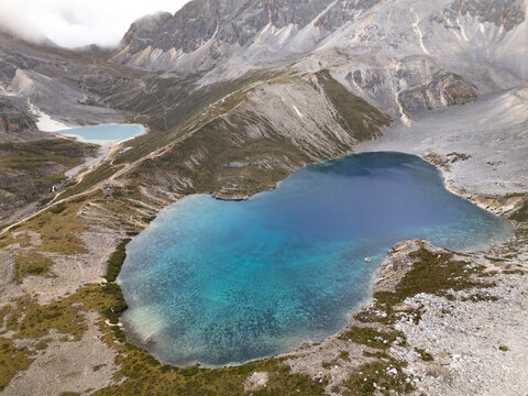 Explore Five-Color Lake and Milk Lake nestled in the highlands of Yading Nature Reserve in Daocheng, Sichuan, China