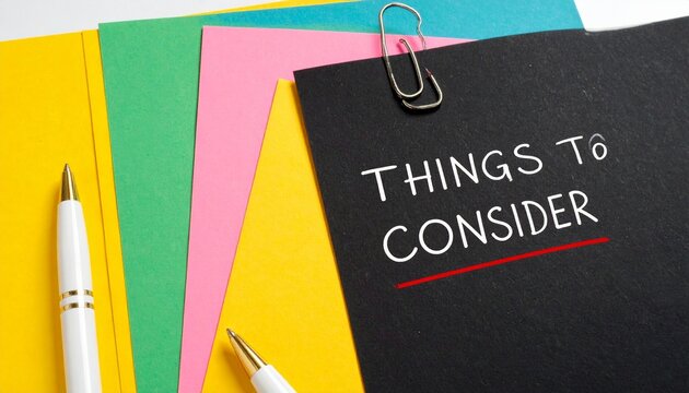 Stack of Colorful Papers with &ldquo;Things to Consider&rdquo; Note
