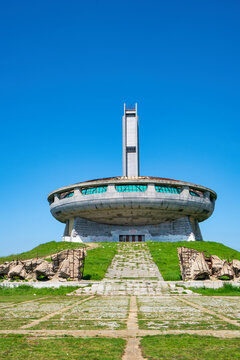 Buzludzha Monument stands tall on a sunny day in Bulgaria