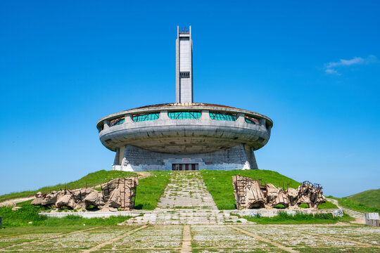 Buzludzha Monument stands as a historic landmark of communist architecture in Bulgaria surrounded by blue sky