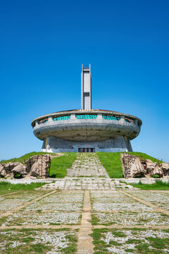 Buzludzha Monument sits on a hilltop in Bulgaria, showcasing its unique architecture and historical significance in the region