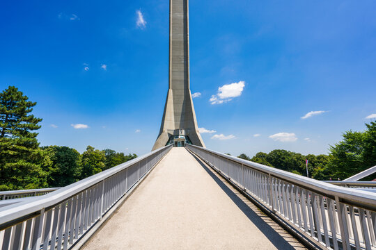 Visitors approach the Avala Tower for views over Belgrade and surrounding areas in Serbia during clear weather