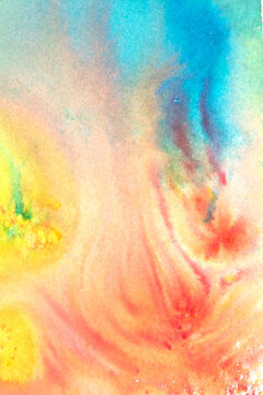 A vibrant and colourful watercolour abstract painting on canvas painted with wild and free brush strokes