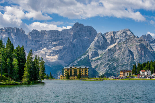 Grand Hotel Misurina near Lake Misurina with mountains under clear sky in Dolomites forest landscape in Italy