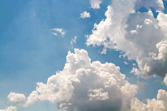 Dramatic White Cumulus Clouds Against a Bright Blue Summer Sky