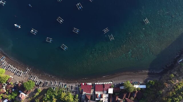 Aerial Drone View Amed Bay Traditional Jukung Fishing Boats Bali Indonesia.