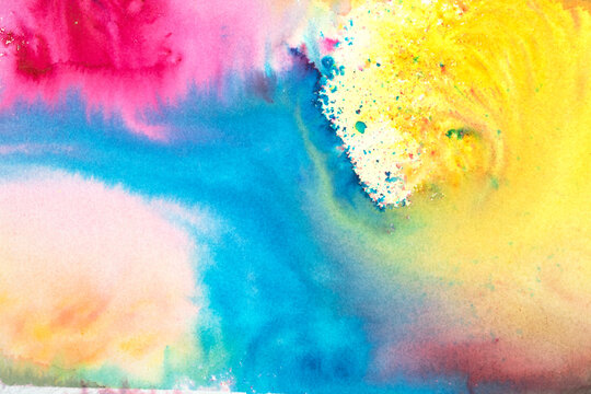 A vibrant and colourful watercolour abstract painting on canvas painted with wild and free brush strokes