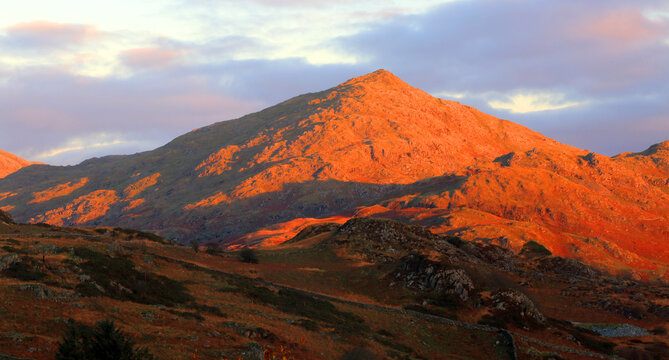 Mountains in evening light near Eskdale, showcasing terrain and nature during sunset in England's Lake District region