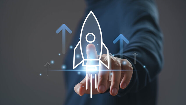 Business startup launch concept with rocket icon and upward arrows representing growth strategy, innovation, success, investment, digital transformation and business acceleration.