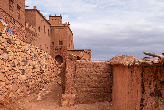 Stone path in fortified village of At Benhaddou on an overcast afternoon in Morocco
