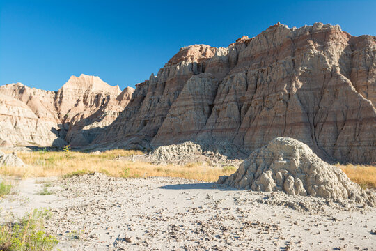 Sedimentary rock layers and eroded formations create unique landscape in Badlands National Park