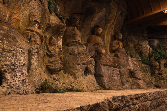 Intricate Usuki stone Buddhas carved into cliffside in Japan show early Buddhist art and craftsmanship