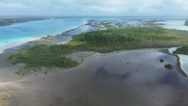 Aerial view of the crystal clear turquoise waters and white sandbars at Canal de los Piratas, Bacalar, Mexico