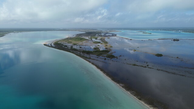 Aerial view of the crystal clear turquoise waters and white sandbars at Canal de los Piratas, Bacalar, Mexico