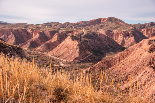 Exploring the layered ridges and ravines of los colorados in granada province, spain