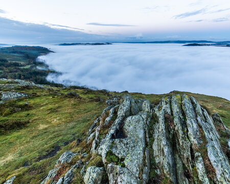 Cloud inversion above Lake Windermere seen from Gummers How during a cloudy day in the UK